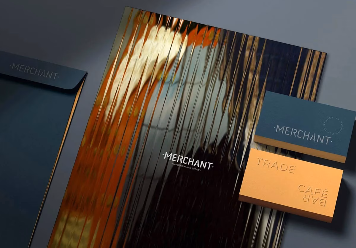 Hospitality-inspired commercial office branding collateral for Merchant Suites