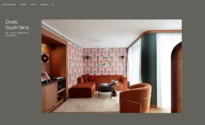 Luchetti Krelle styled hotel suite with retro patterns, warm tones, and contemporary hospitality interior design