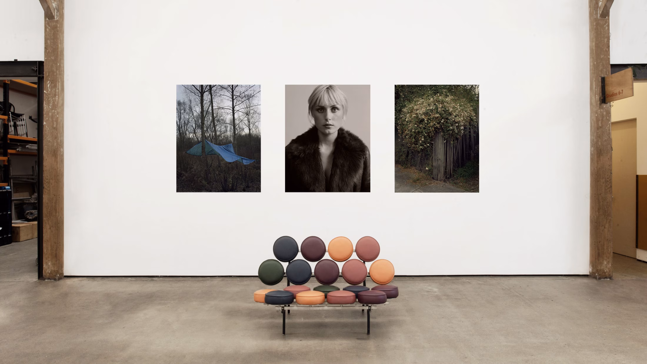 Placemaking at Sun Studios - exhibition of photography with modern button bench in front
